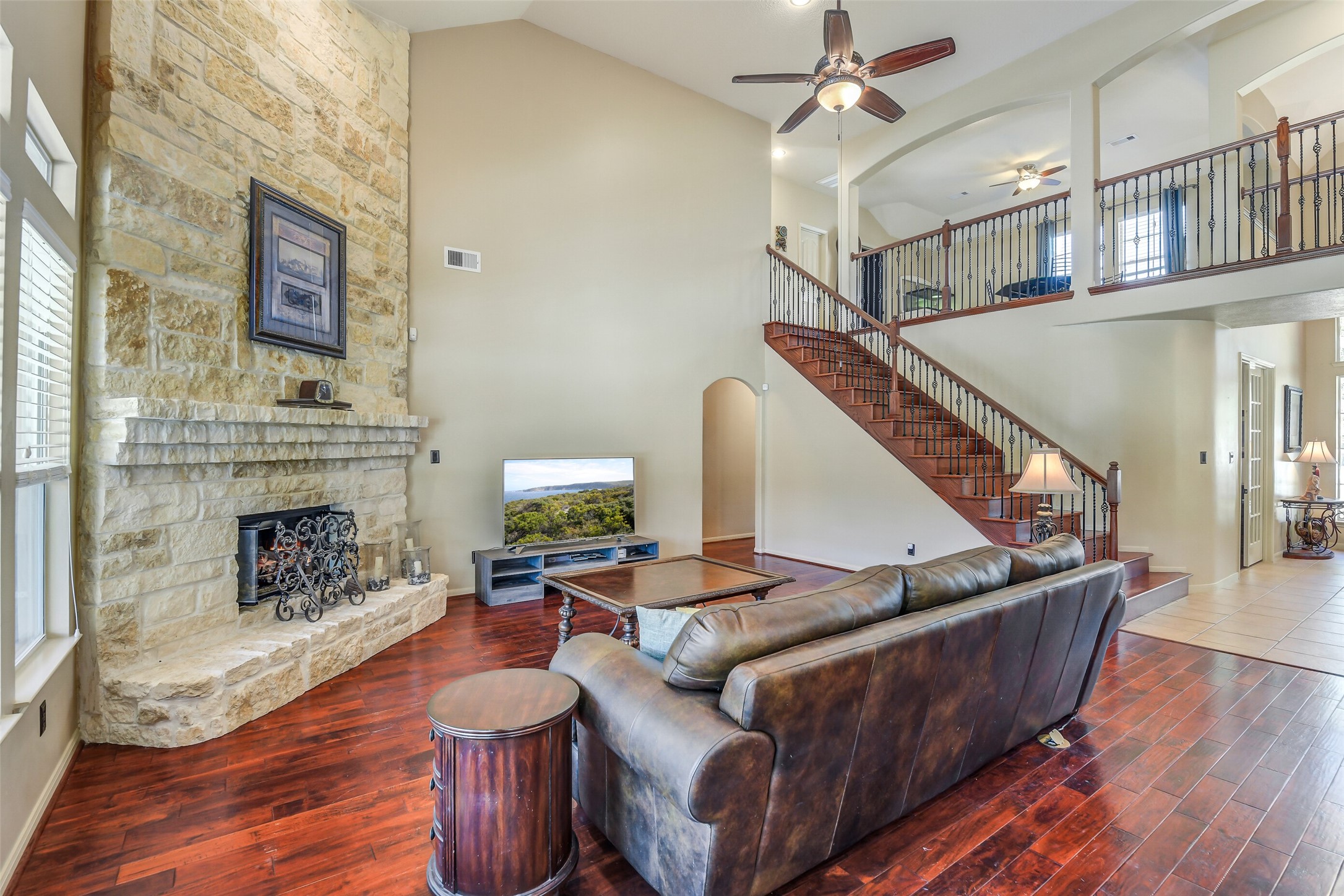 32711 Tall Oaks Way Magnolia, TX 77354 - Photo 7 of 50 a living room with furniture and a fireplace