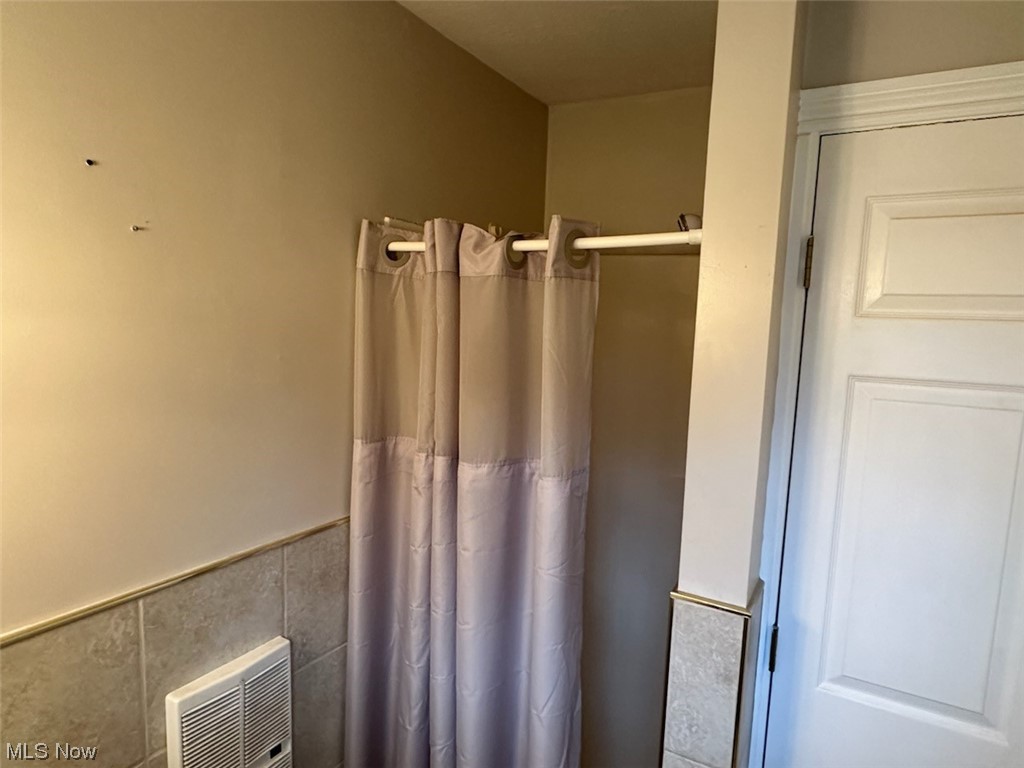 4396 Rootstown Road Rootstown, OH 44272 - Photo 18 of 21 Bathroom with tile walls