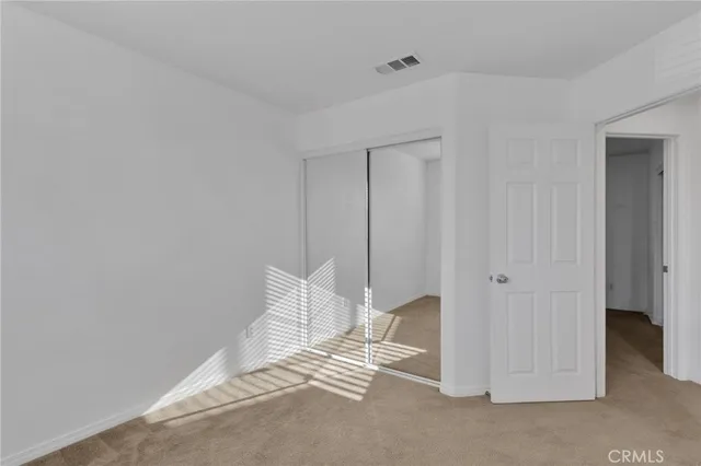 a view of room with hallway