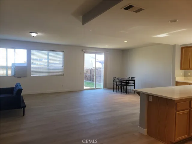 a view of livingroom with furniture and windows