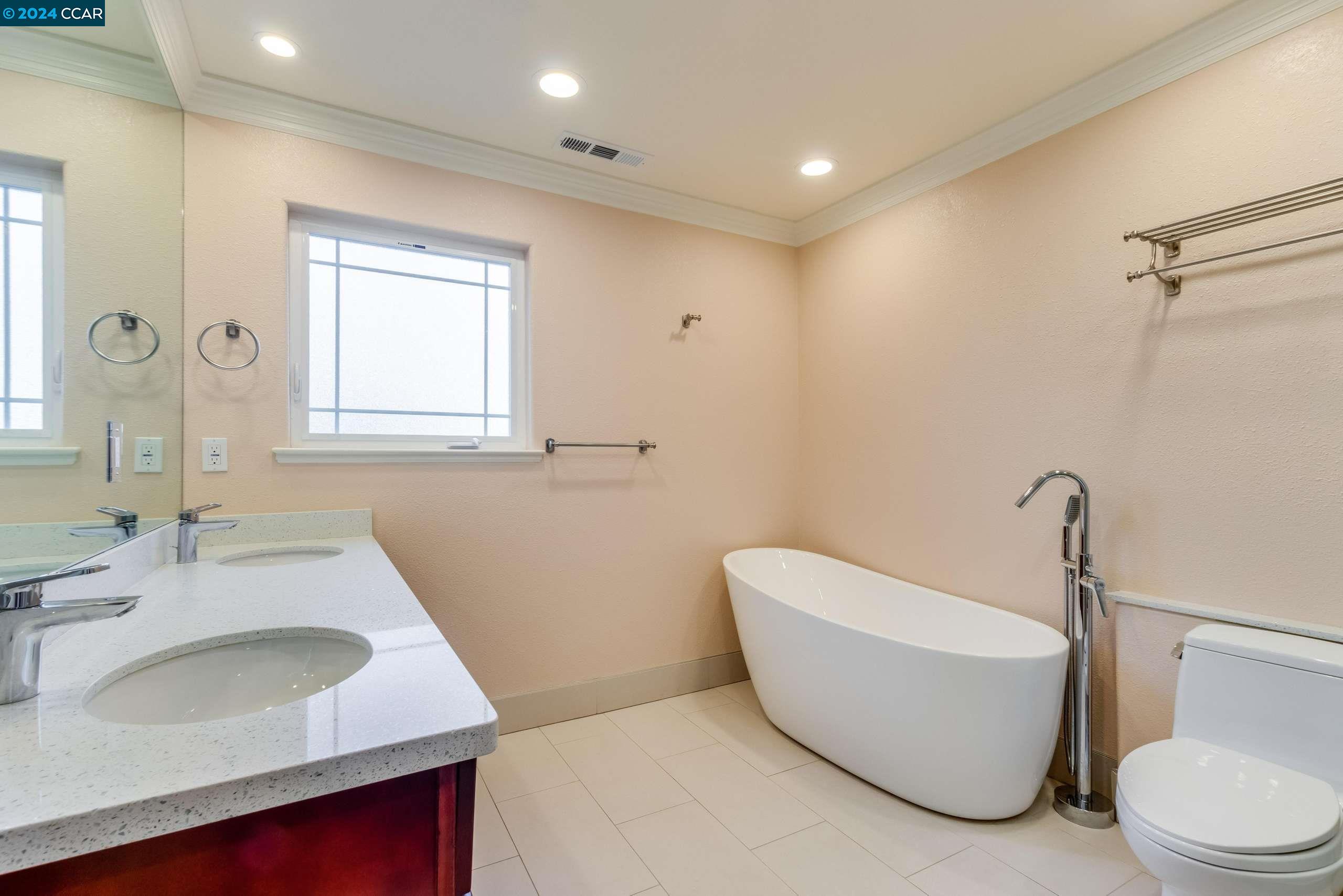 540 Helen Drive Millbrae, CA 94030 - Photo 12 of 24 a bathroom with a sink toilet and shower