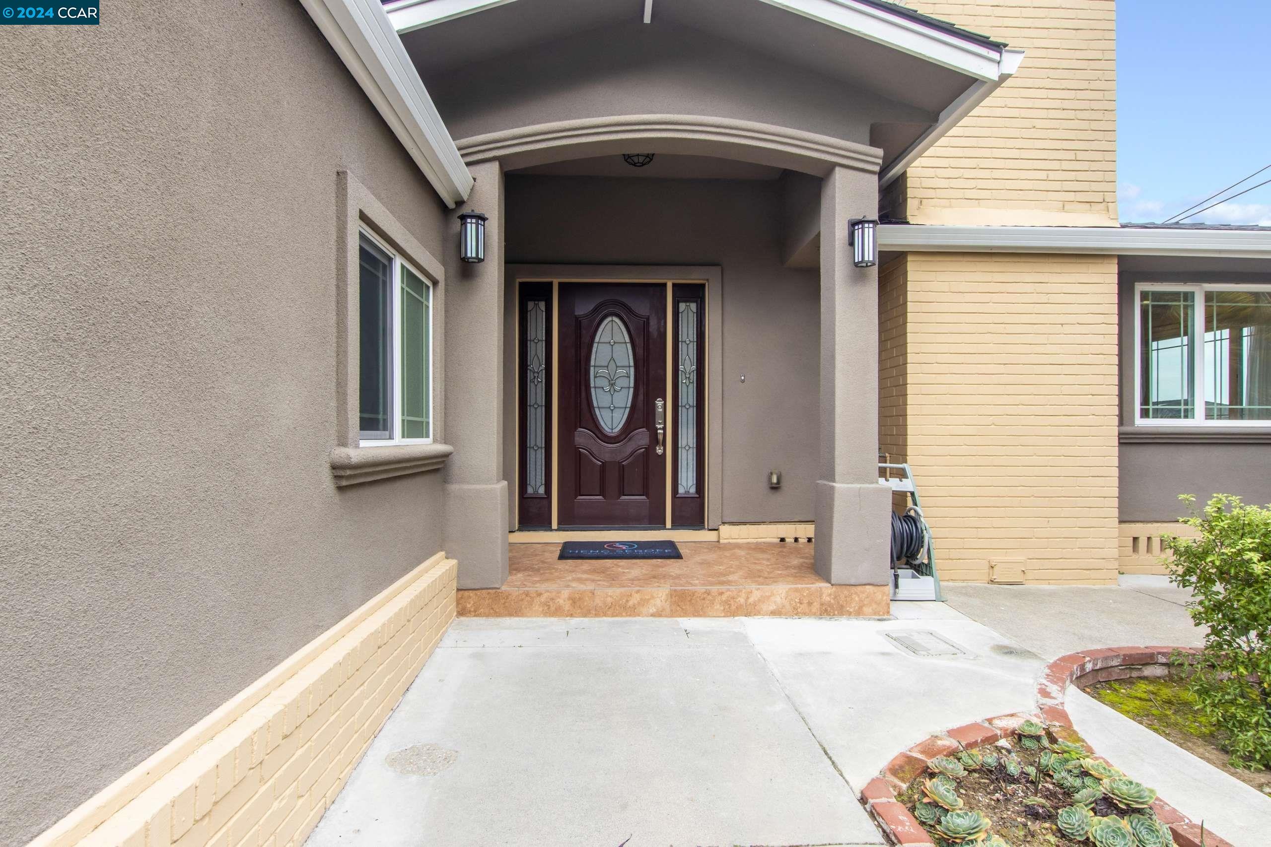 540 Helen Drive Millbrae, CA 94030 - Photo 3 of 24 a view of a house with entryway and a yard