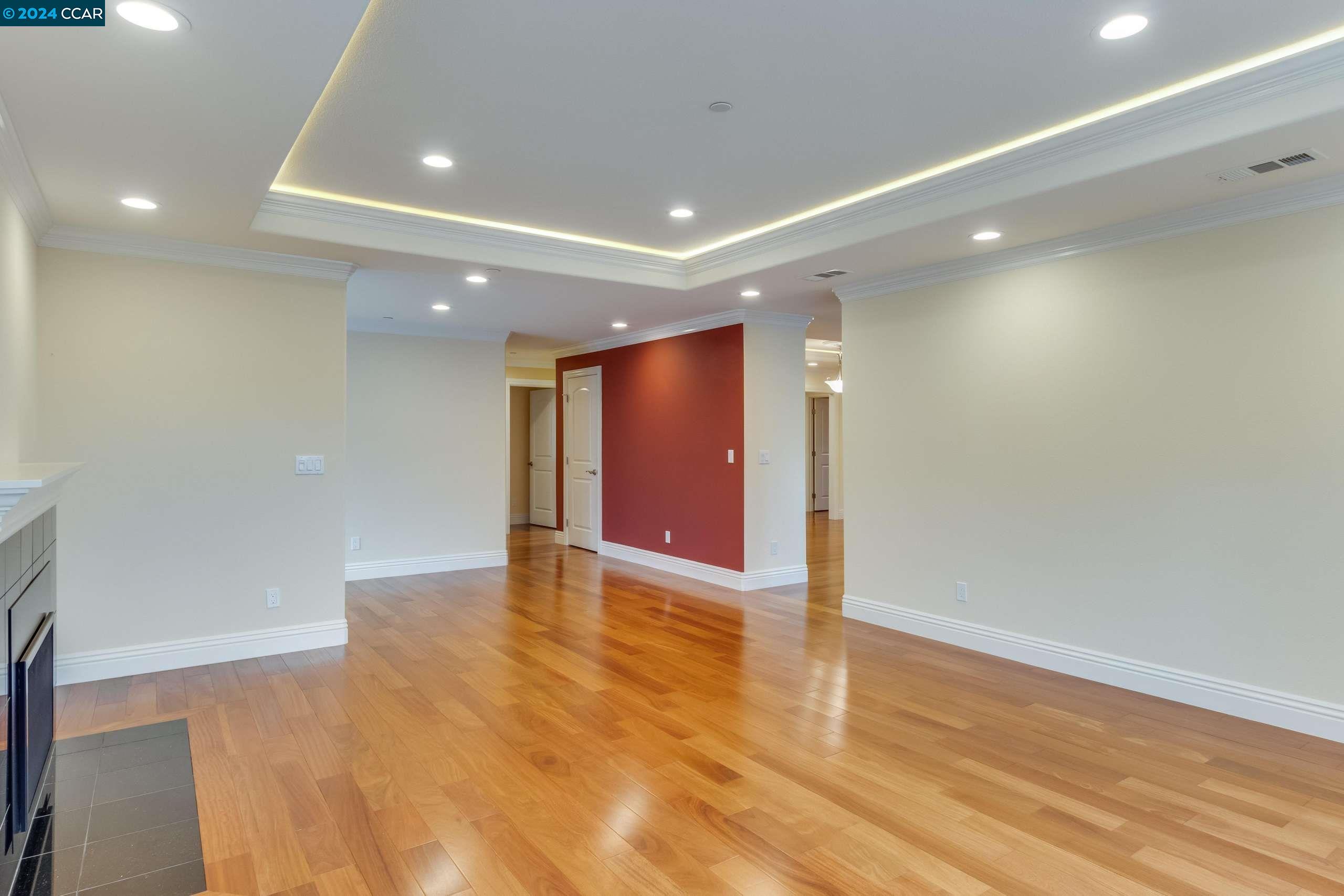 540 Helen Drive Millbrae, CA 94030 - Photo 4 of 24 a view of an empty room with wooden floor