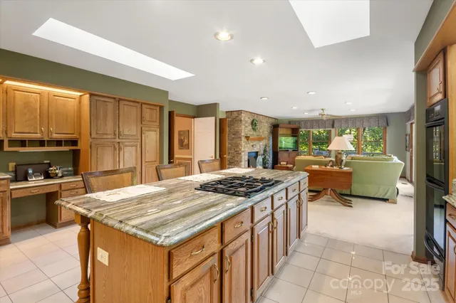 a large bathroom with a large tub and sink