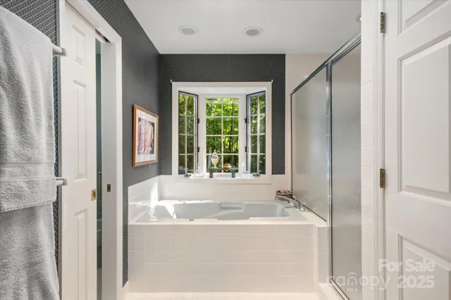 a utility room with sink dryer and washer
