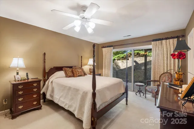 a view of a yard with table and chairs