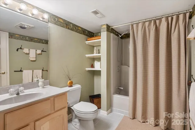 a view of a swimming pool with a yard