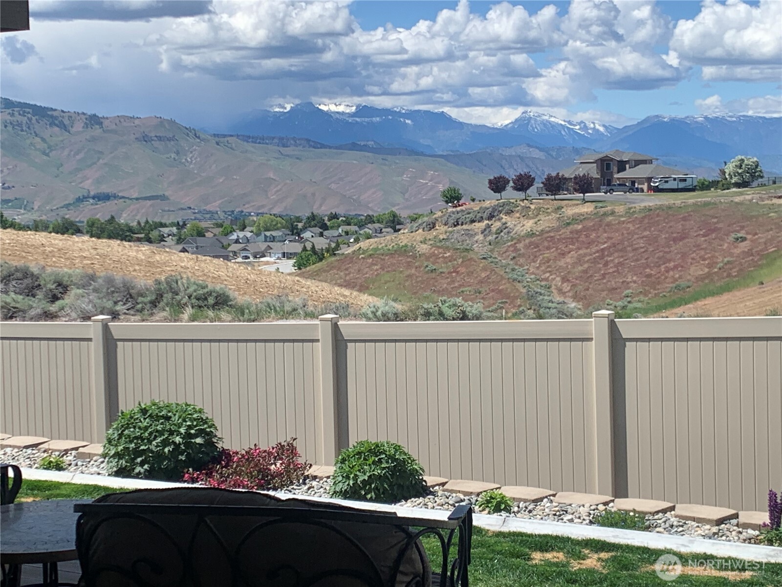 1308 Tractor Loop East Wenatchee, WA 98802 - Photo 2 of 35 a view of a backyard
