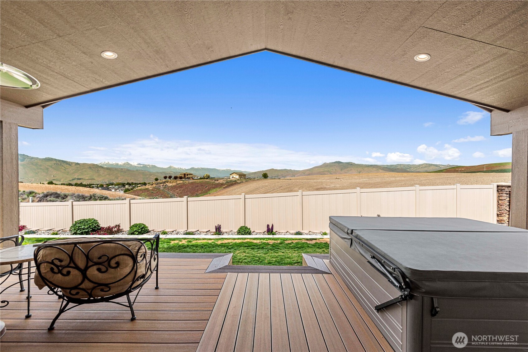 1308 Tractor Loop East Wenatchee, WA 98802 - Photo 22 of 35 a view of a balcony with wooden floor and outdoor space