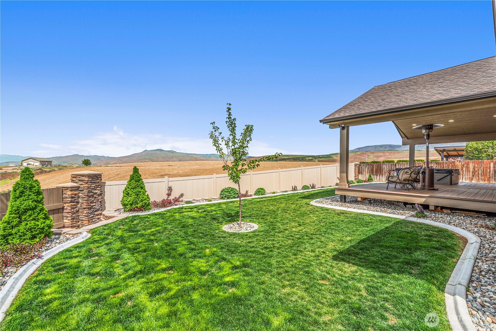 1308 Tractor Loop East Wenatchee, WA 98802 - Photo 30 of 35 a view of a house with pool and a yard