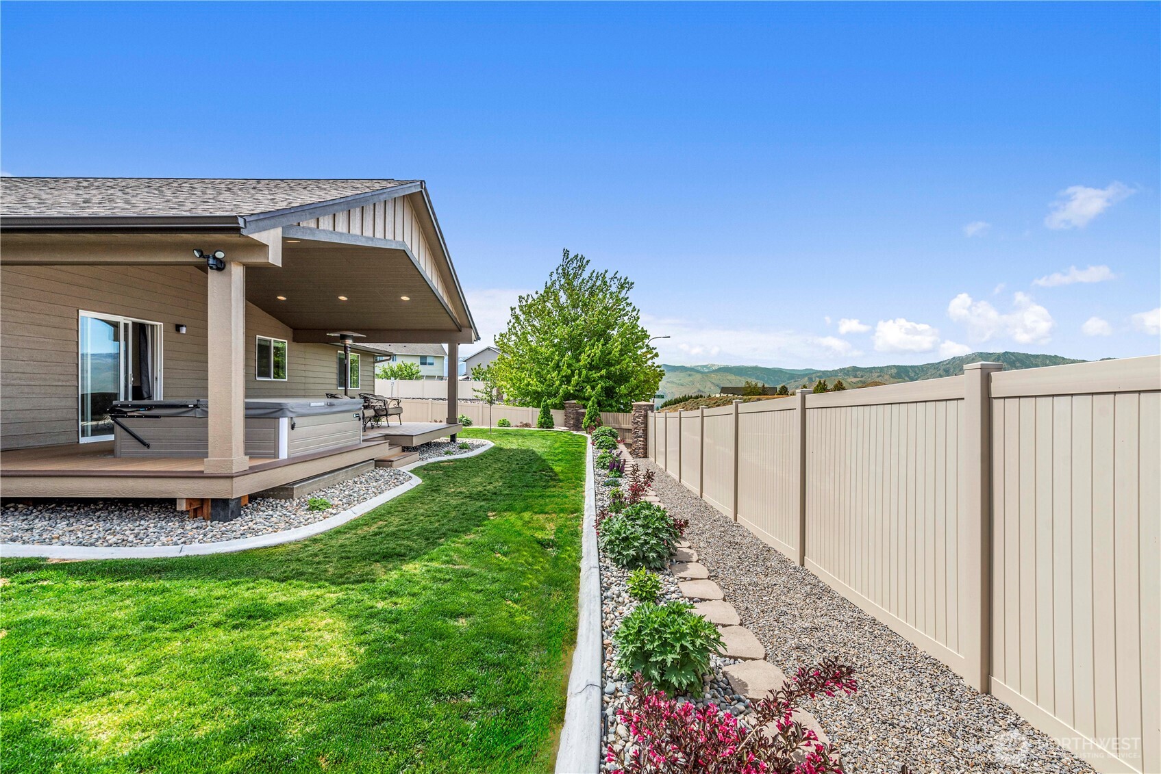 1308 Tractor Loop East Wenatchee, WA 98802 - Photo 33 of 35 a view of a house with backyard and garden