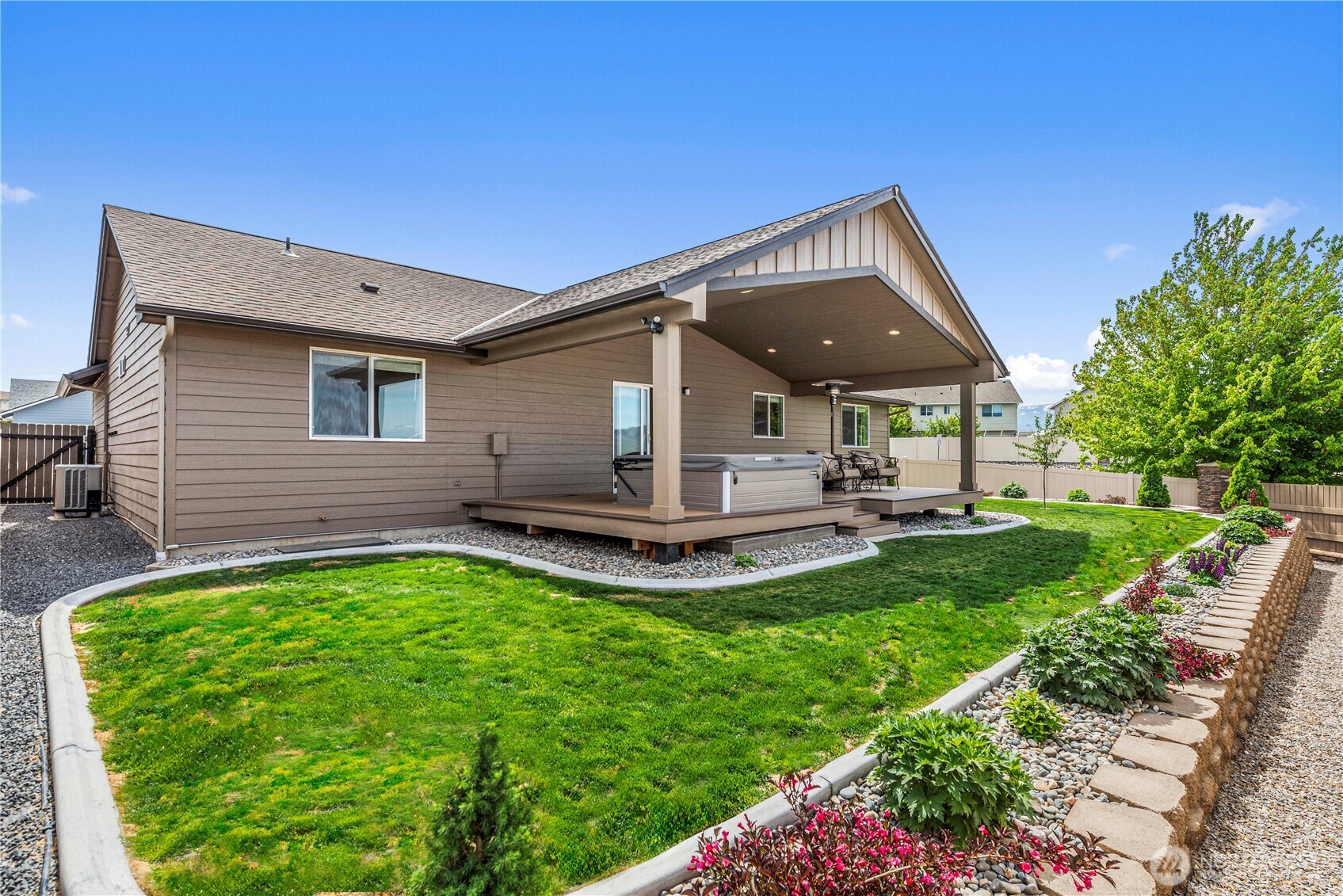 1308 Tractor Loop East Wenatchee, WA 98802 - Photo 34 of 35 a view of a house with a backyard