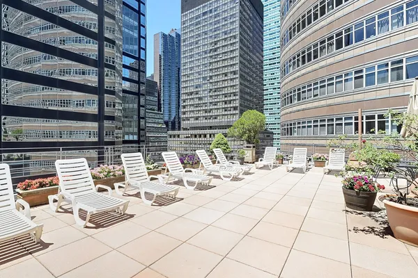 a view of a terrace with sitting area