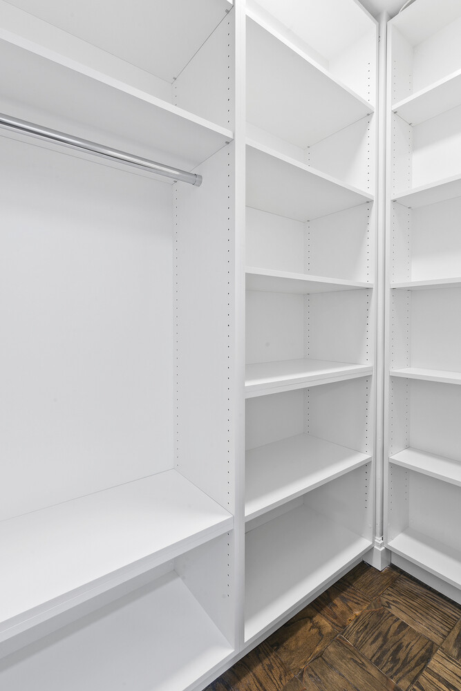 211 East 53rd Street, Unit 3M Manhattan, NY 10022 - Photo 6 of 11 a view of an empty walk in closet