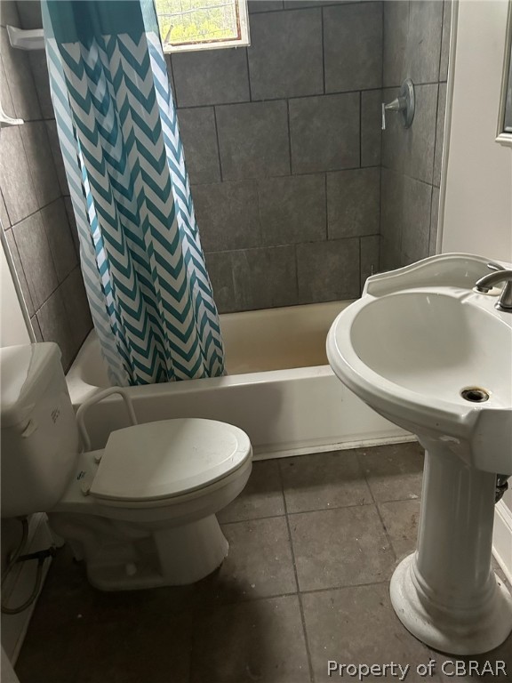 6258 Windmill Point Road White Stone, VA 22578 - Photo 22 of 34 Bathroom with tile patterned flooring, toilet, and shower / tub combo with curtain