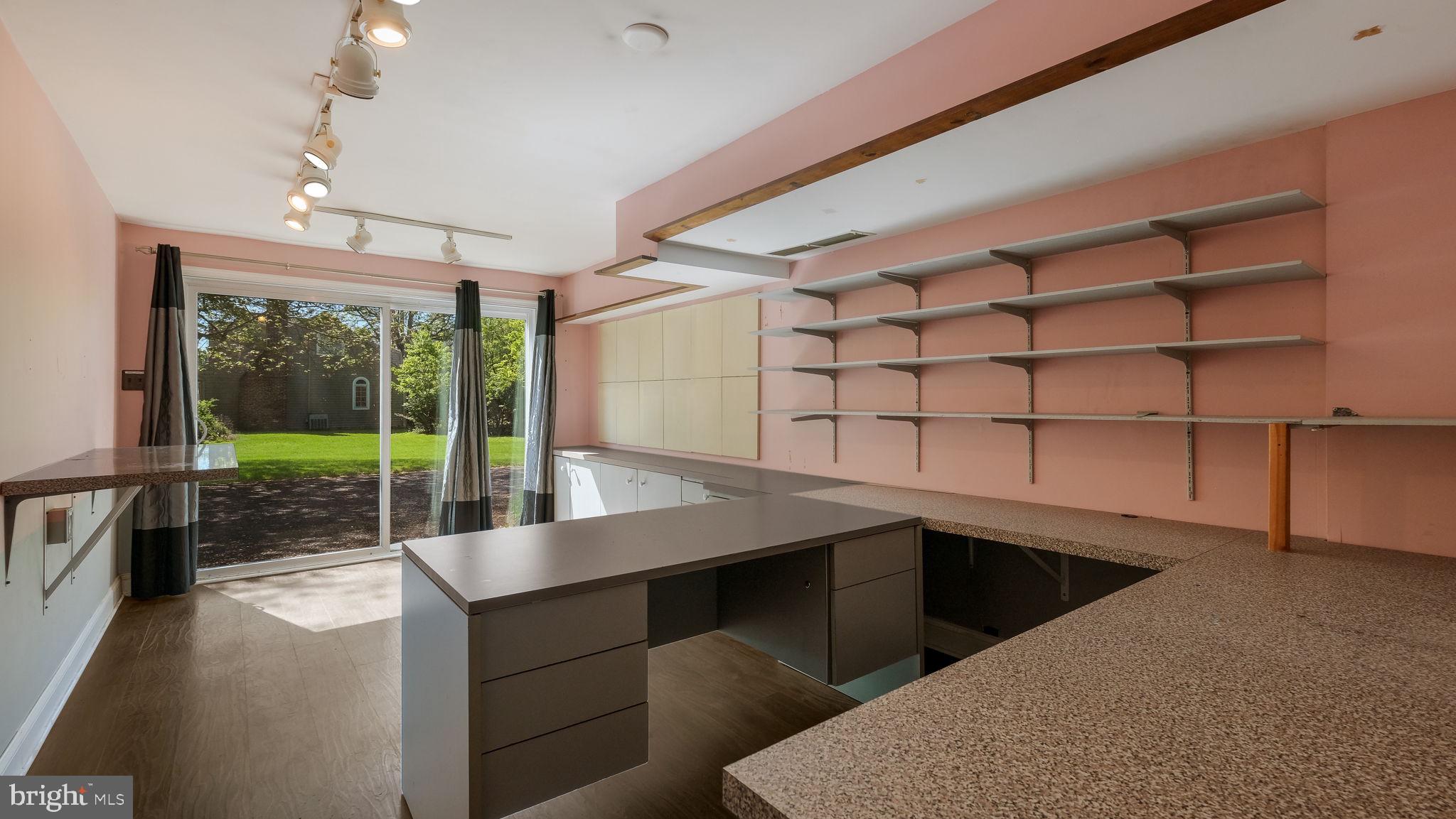 2775 Red Gate Drive Doylestown, PA 18902 - Photo 19 of 38 a view of a room with shelves and wooden floor