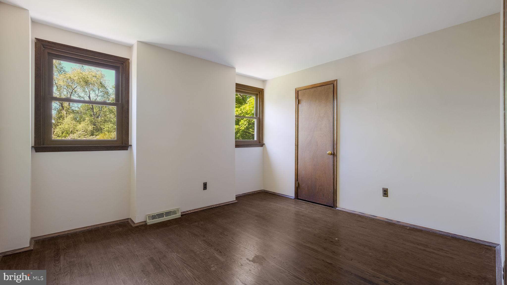 2775 Red Gate Drive Doylestown, PA 18902 - Photo 25 of 38 an empty room with wooden floor and windows