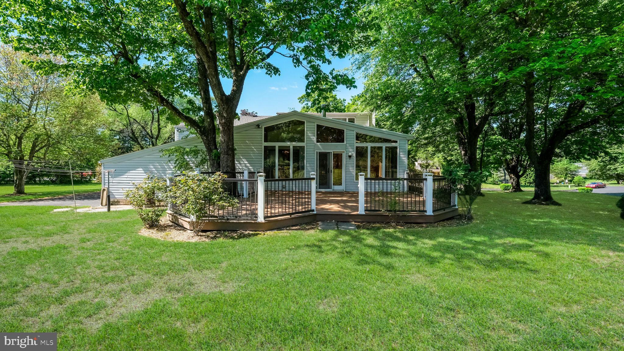 2775 Red Gate Drive Doylestown, PA 18902 - Photo 31 of 38 a view of a house with backyard sitting area and garden