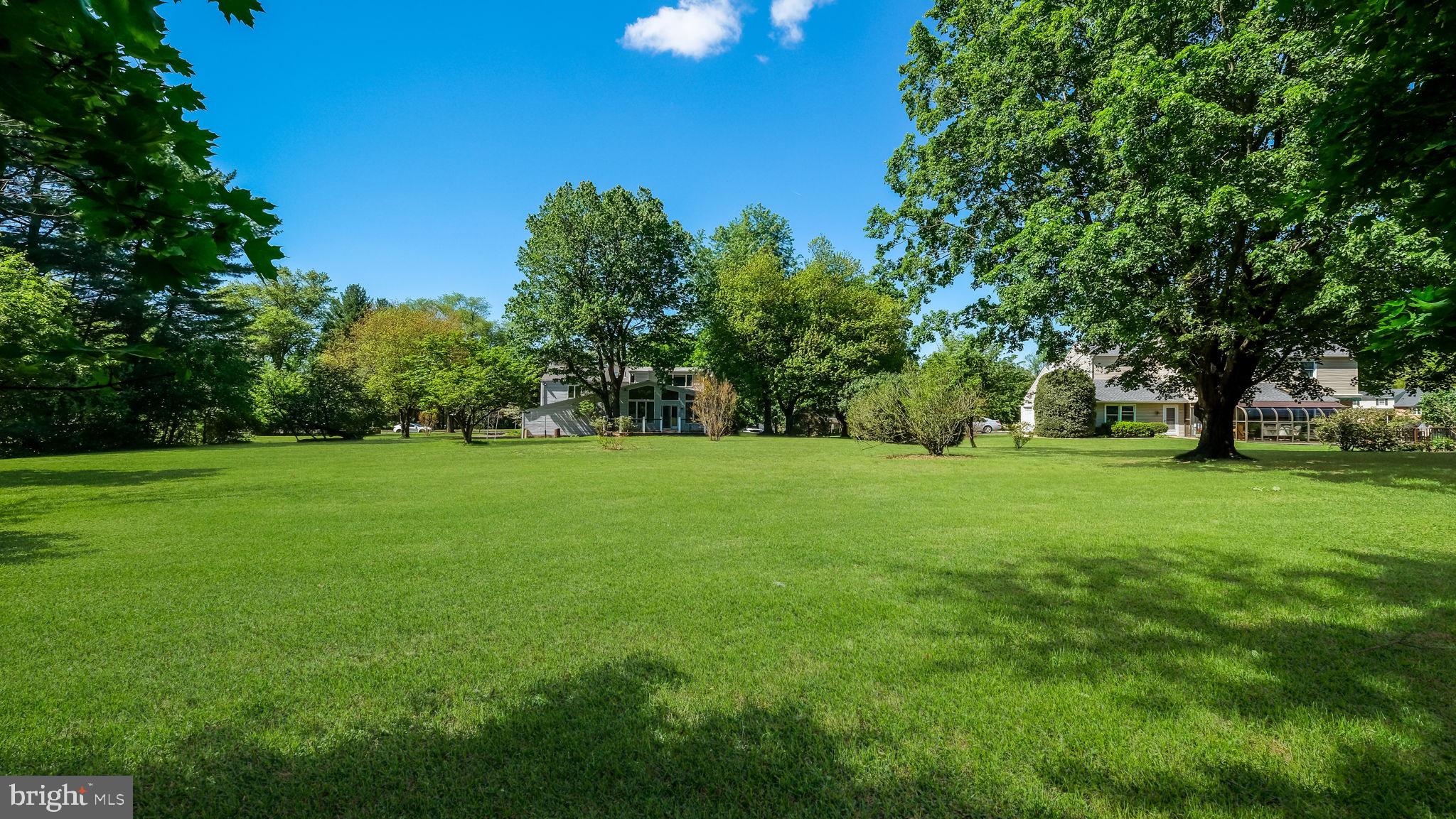 2775 Red Gate Drive Doylestown, PA 18902 - Photo 34 of 38 a view of green field with trees in the background