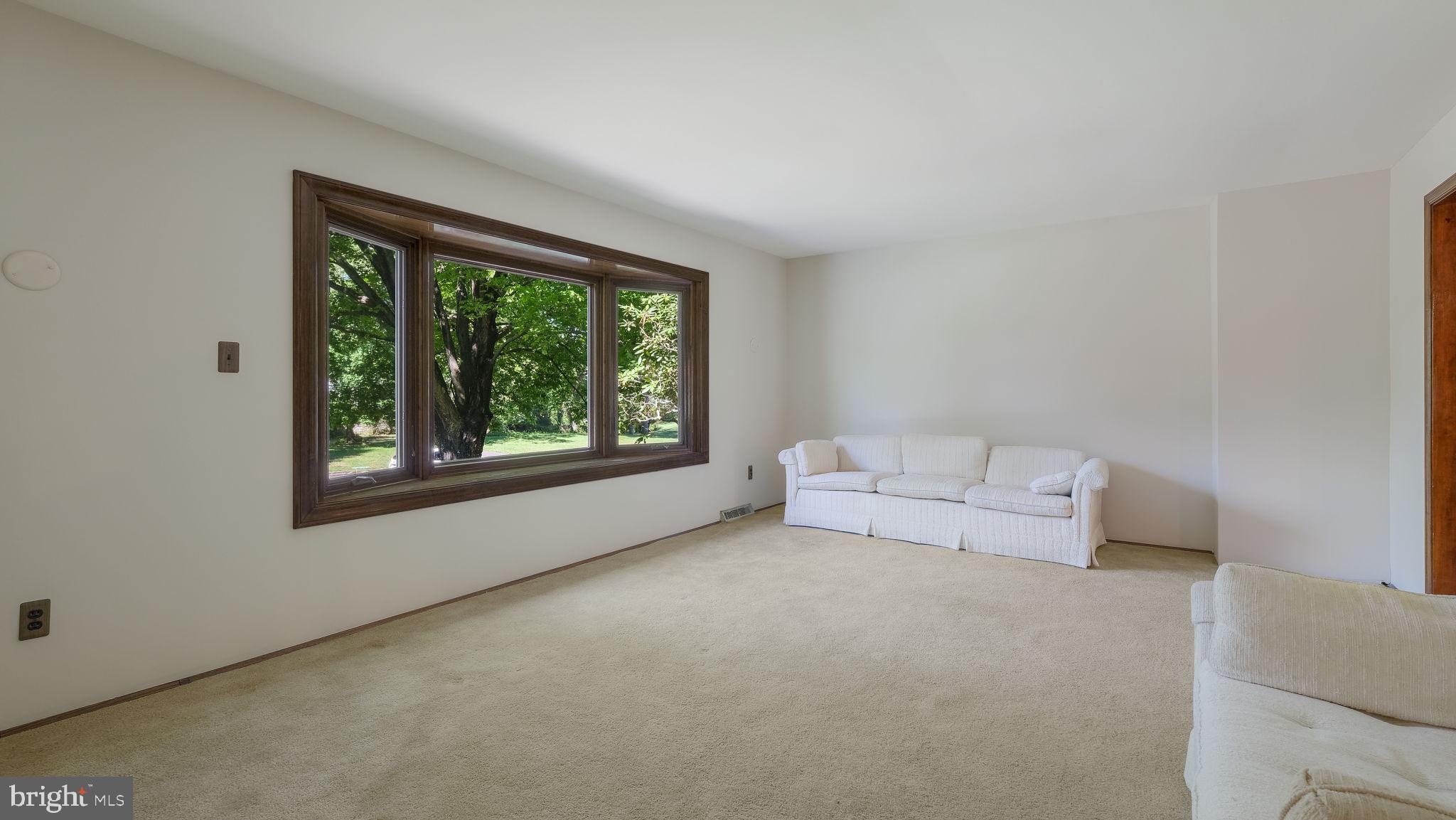 2775 Red Gate Drive Doylestown, PA 18902 - Photo 6 of 38 a living room with furniture and a large window