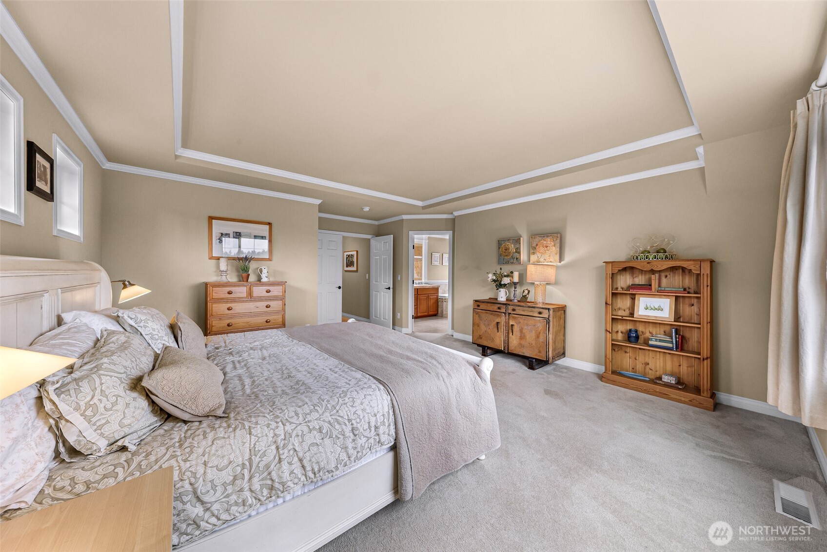 2029 240th Place Southeast Bothell, WA 98021 - Photo 24 of 39 a bedroom with a bed a couch and dresser