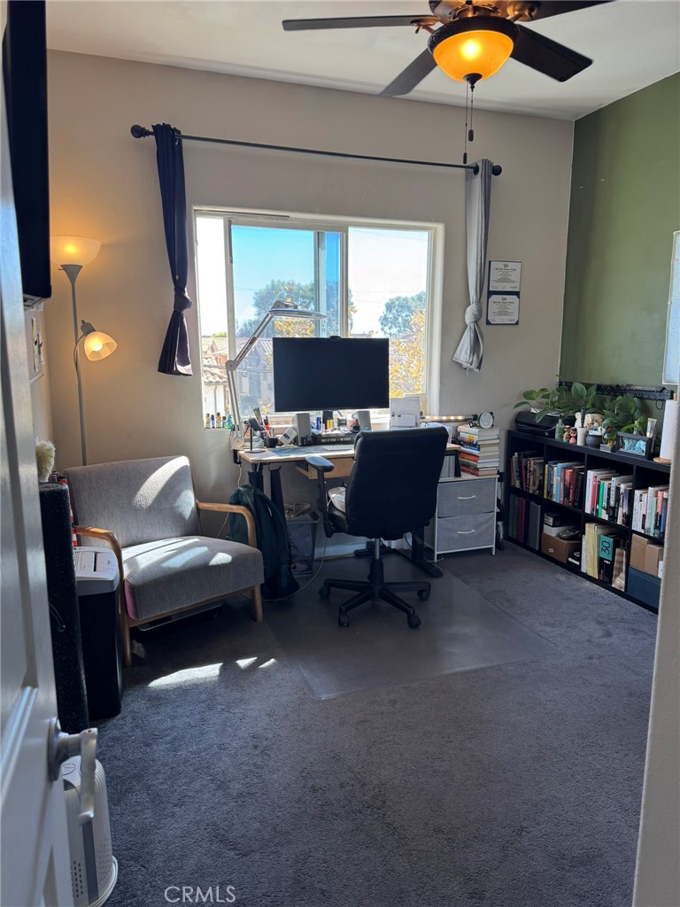 12375 Osborne Place, Unit 7 Pacoima, CA 91331 - Photo 16 of 30 a living room with furniture and a window