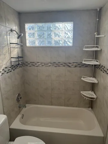a bathroom with a bathtub