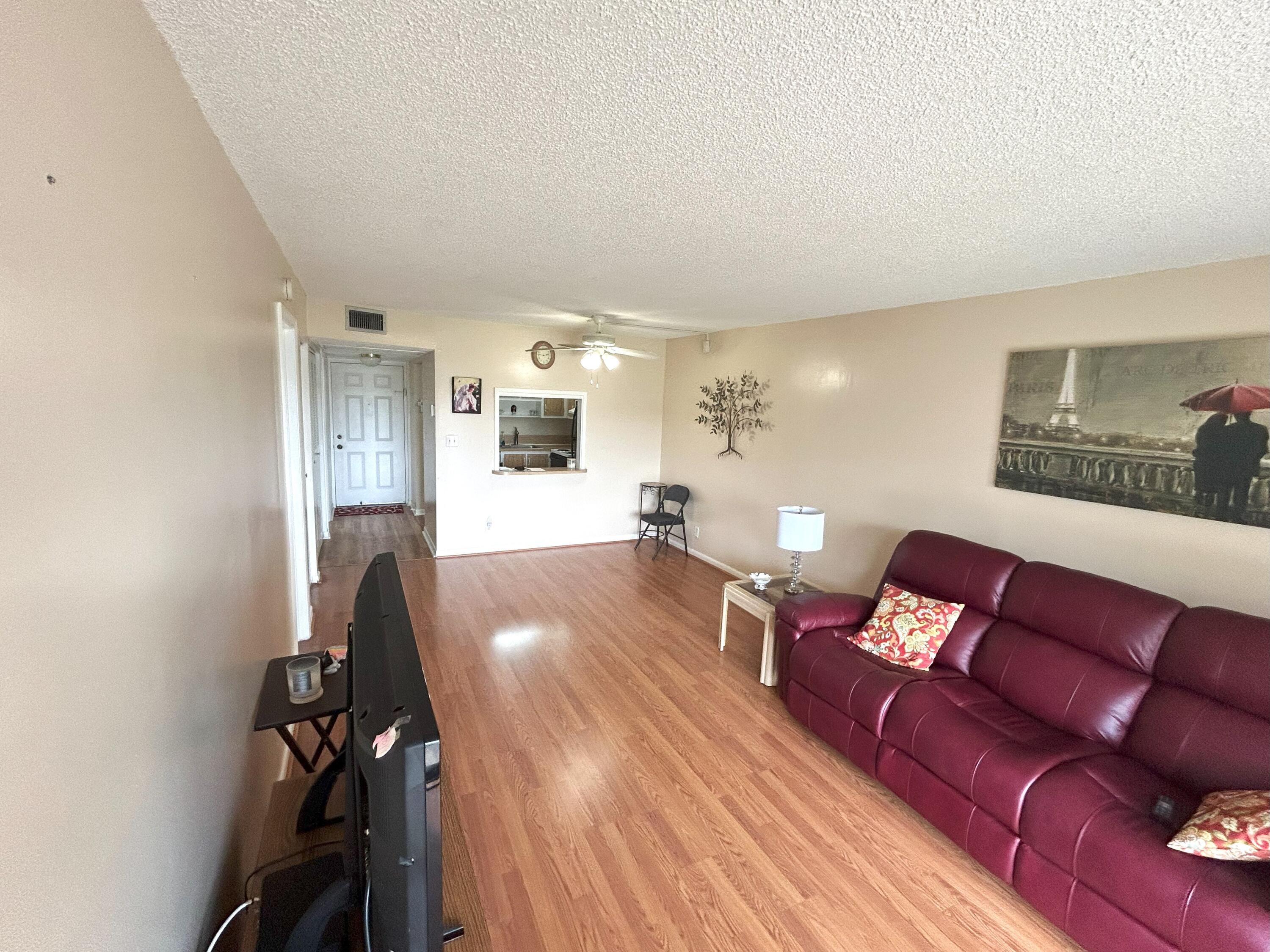 9300 Southwest 8th Street, Unit 216 Boca Raton, FL 33428 - Photo 6 of 31 Living Room / Dining Room