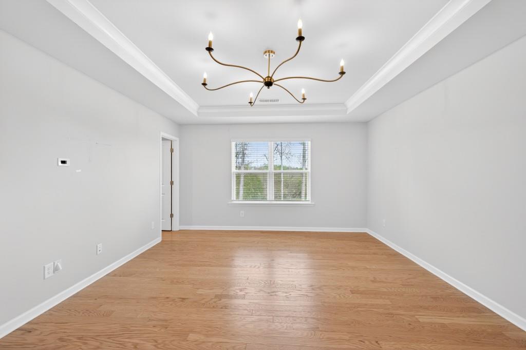 7277 Maple Brook Lane Flowery Branch, GA 30542 - Photo 47 of 57 a view of an empty room with a window