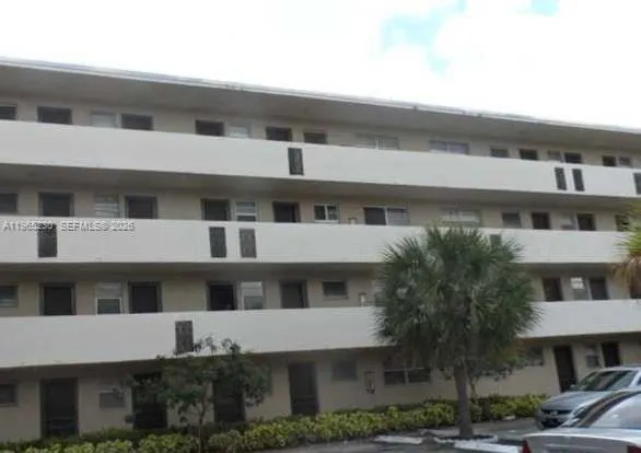 a front view of residential houses with street