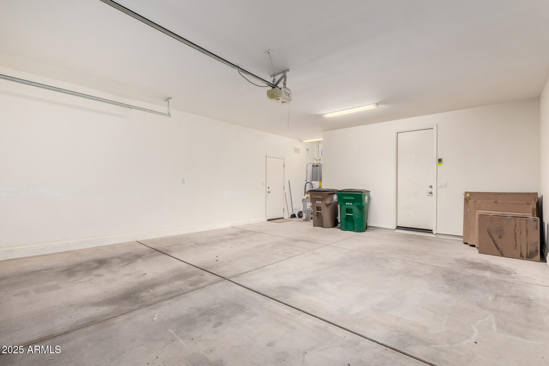16093 West Almeria Road Goodyear, AZ 85395 - Photo 31 of 38 garage 1