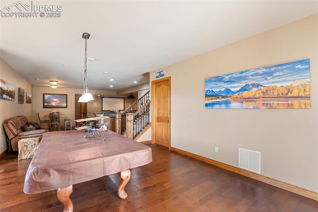 5070 Vessey Road Colorado Springs, CO 80908 - Photo 27 of 49 Rec room with visible vents, baseboards, recessed lighting, dark wood-style floors, and billiards