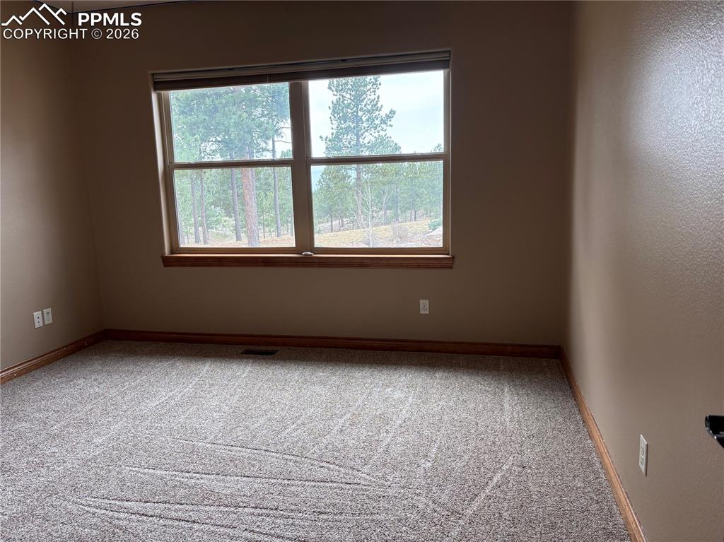 5070 Vessey Road Colorado Springs, CO 80908 - Photo 36 of 43 Room on upper floor to left