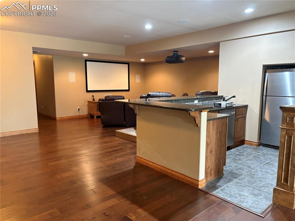 5070 Vessey Road Colorado Springs, CO 80908 - Photo 39 of 43 Lower level with Sony projector