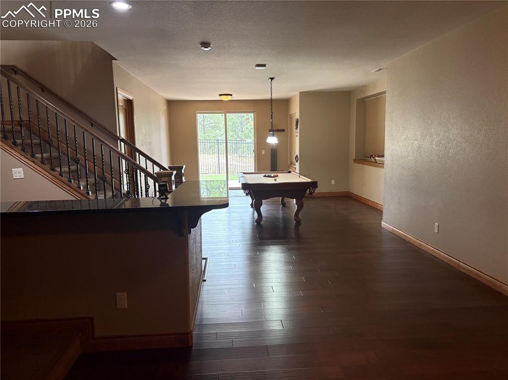5070 Vessey Road Colorado Springs, CO 80908 - Photo 40 of 43 Pool table in lower level with new flooring