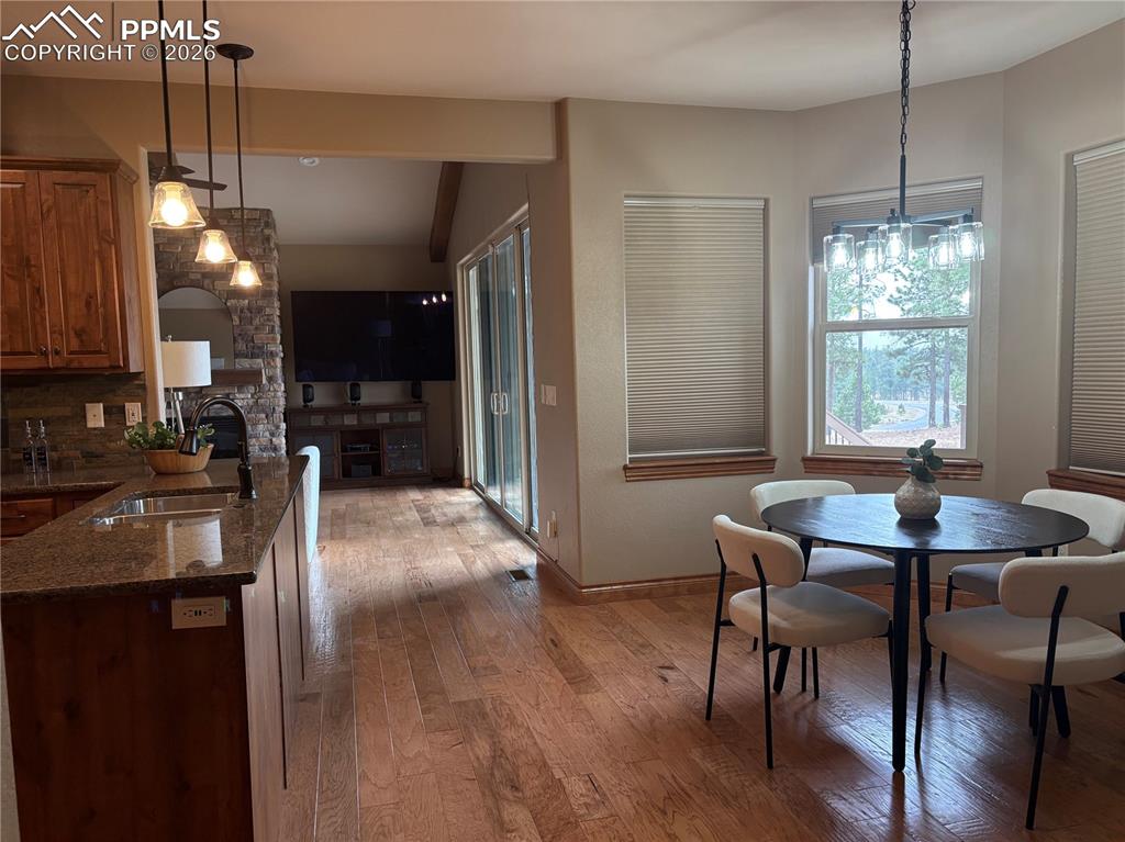 5070 Vessey Road Colorado Springs, CO 80908 - Photo 41 of 43 Little breakfast nook off kitchen with new lightning