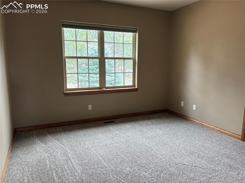 5070 Vessey Road Colorado Springs, CO 80908 - Photo 43 of 43 Room on upper floor to the right