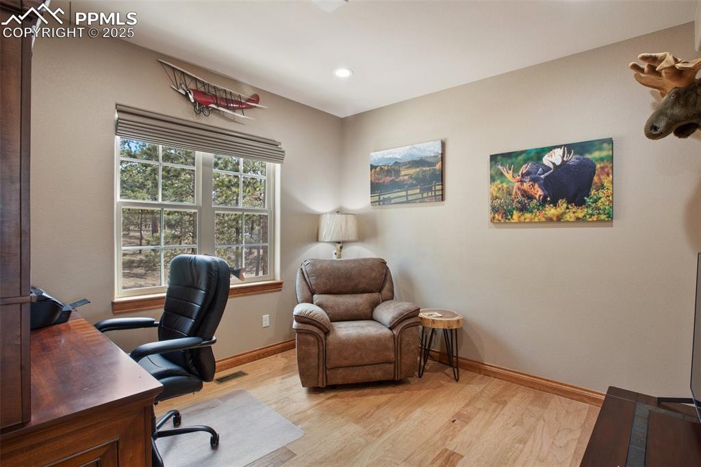 5070 Vessey Road Colorado Springs, CO 80908 - Photo 9 of 43 Home office with recessed lighting, visible vents, light wood-style flooring, and baseboards