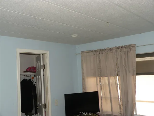 a view of a closet in a room