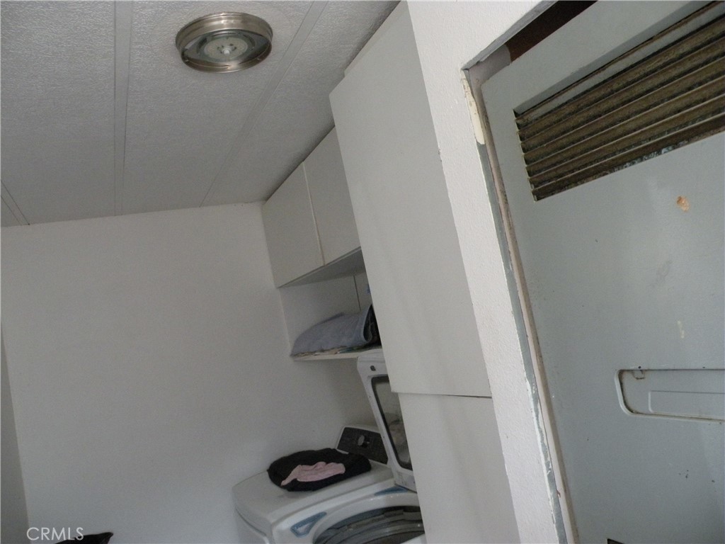 350 East San Jacinto Avenue, Unit 121 Perris, CA 92571 - Photo 10 of 24 a close view of shoes stand and cabinets