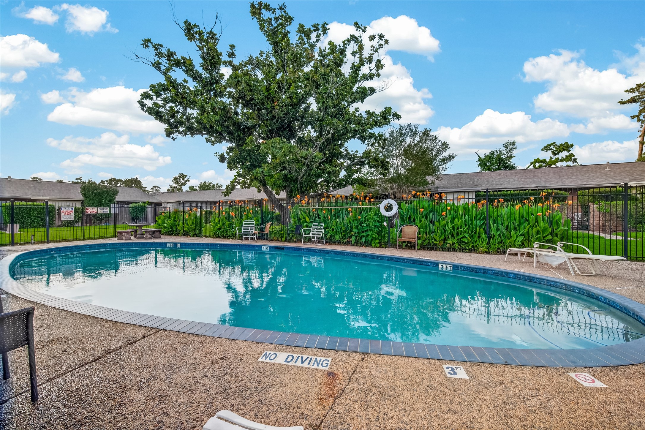1529 Wirt Road, Unit 1 Houston, TX 77055 - Photo 13 of 16 a view of a swimming pool with a patio