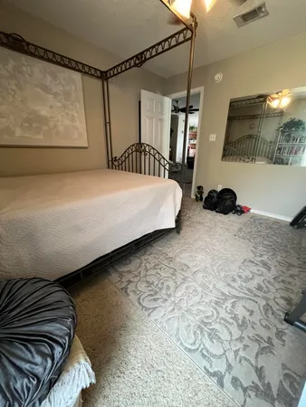 a view of livingroom with furniture and flat screen tv