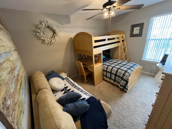 a view of a patio with wooden floor
