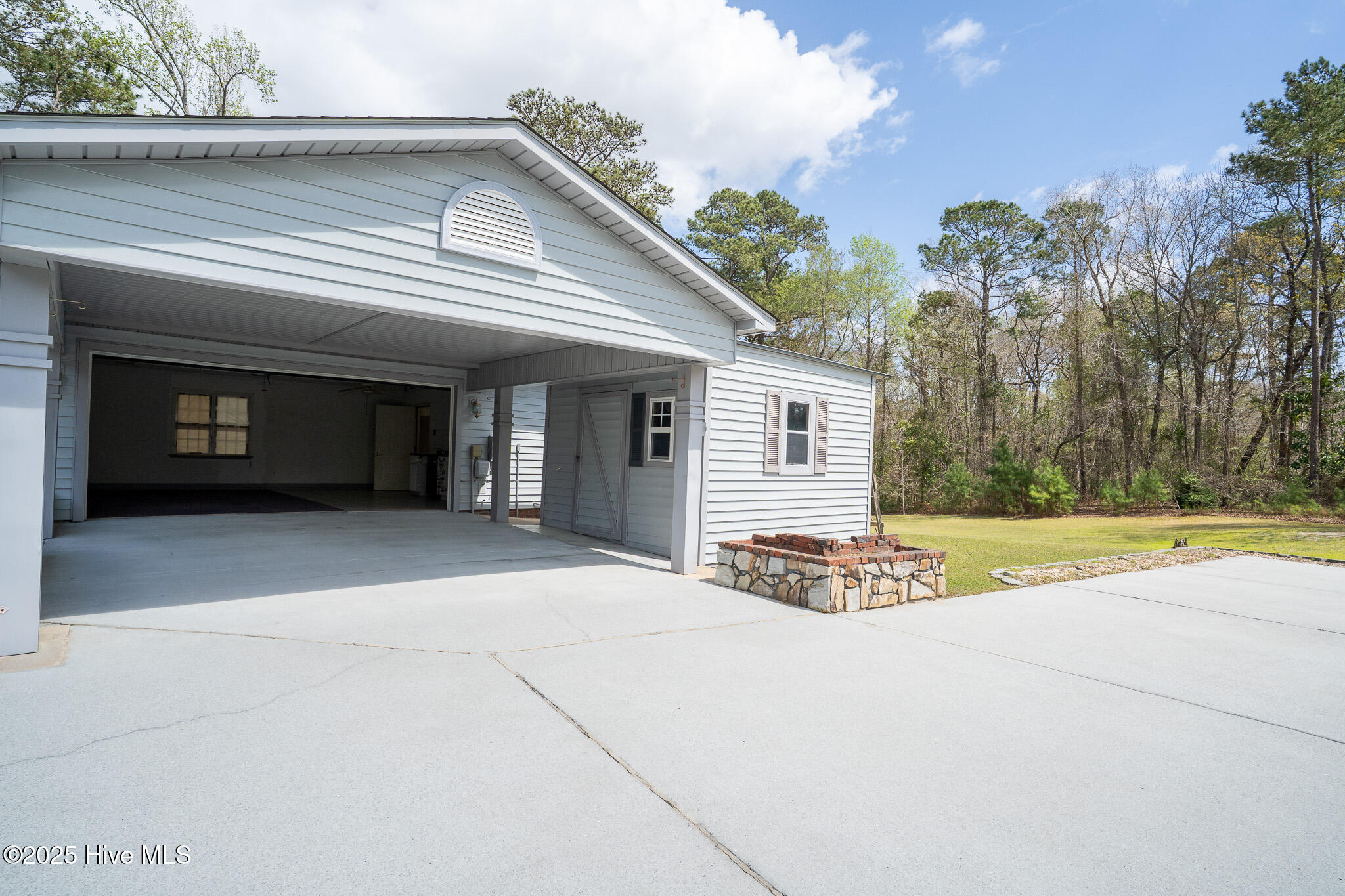 428 Ridge Road Jacksonville, NC 28540 - Photo 31 of 34 Carport, 2 car garage and storage building