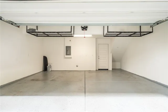 a table and chairs sitting in front of a building