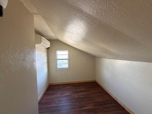 822 East Santa Fe Avenue Canadian, TX 79014 - Photo 19 of 19 a view of an empty room with wooden floor and a window