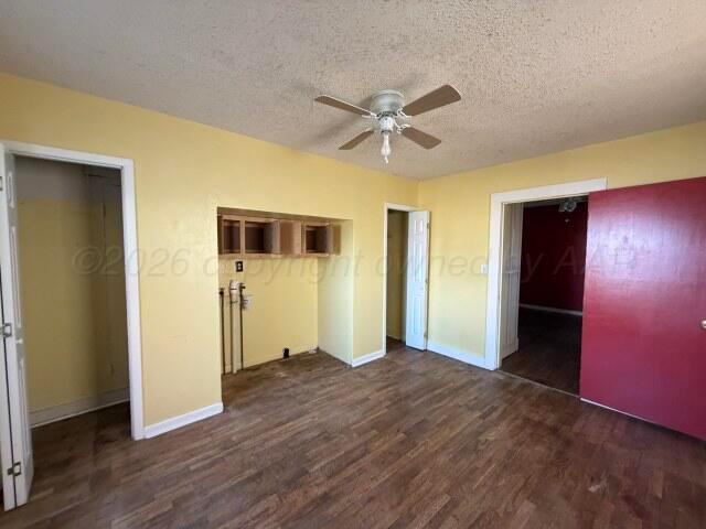 822 East Santa Fe Avenue Canadian, TX 79014 - Photo 9 of 19 a view of empty room with wooden floor