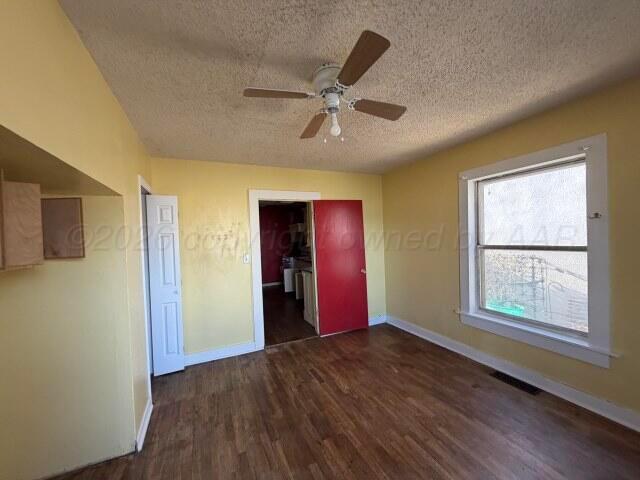 822 East Santa Fe Avenue Canadian, TX 79014 - Photo 10 of 19 a view of an empty room with a window