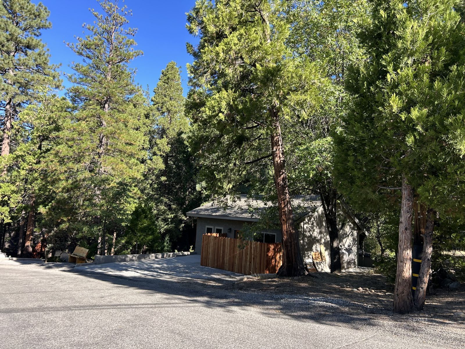 a view of a house with a tree