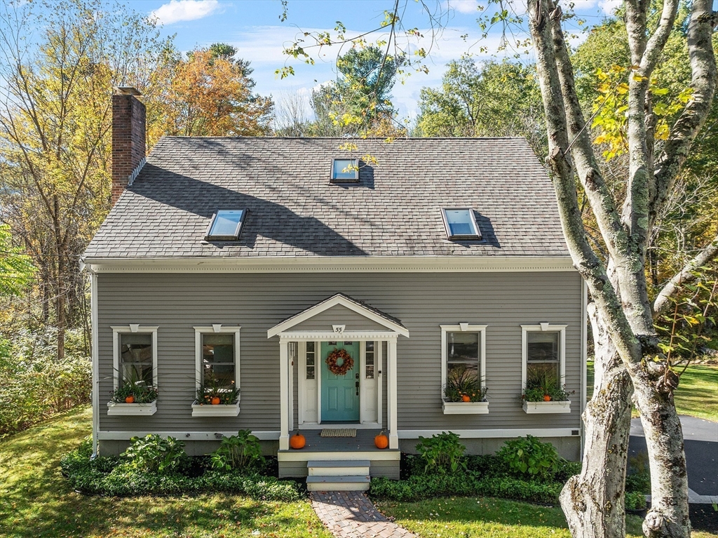 55 Carroll Road Grafton, MA 01536 - Photo 1 of 40 front view of a house with a yard